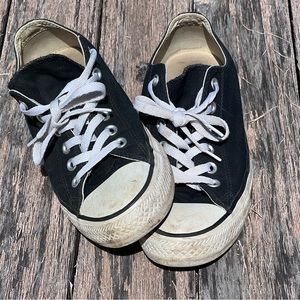 Women’s Converse All Star black low top sneakers. Double tongue top purple